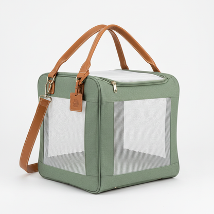 Premium sage green pet carrier bag with breathable mesh panels and tan leather handles